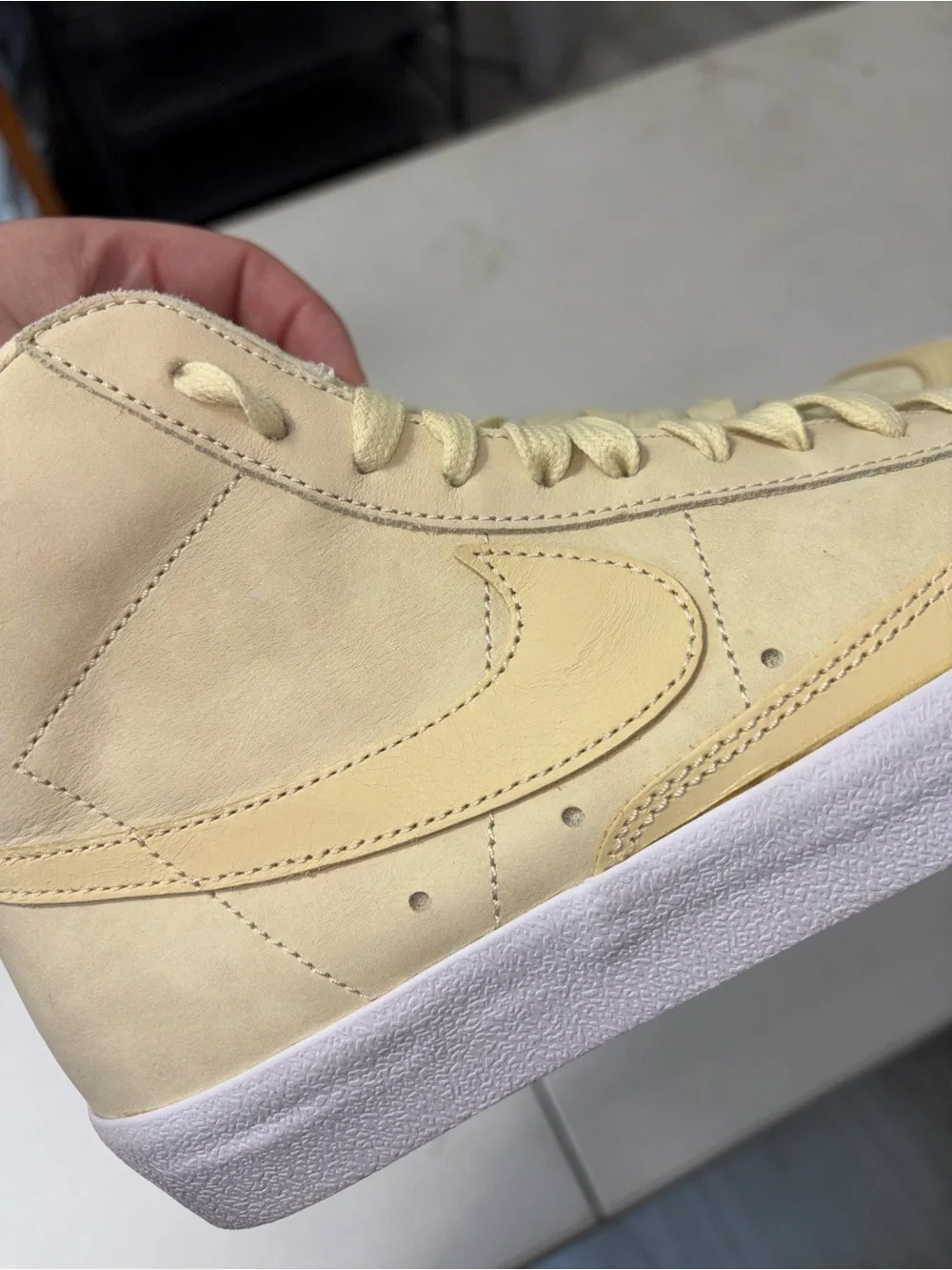 Nike Women’s High-Top Sneakers in Pale Yellow and White